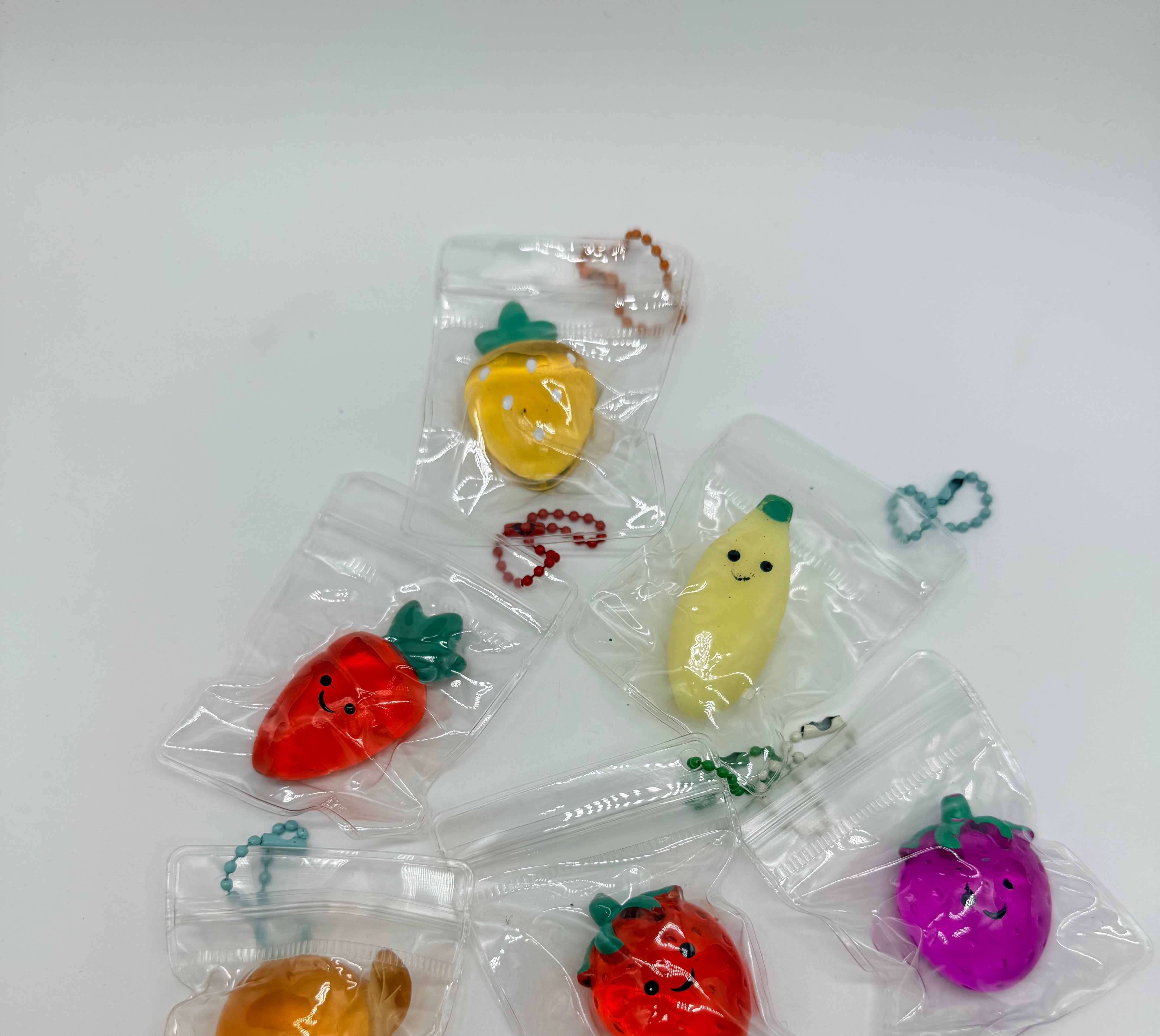 Tiny Fruit Squish Toy-340 Other Accessories-Youngsga-Heathered Boho Boutique, Women's Fashion and Accessories in Palmetto, FL