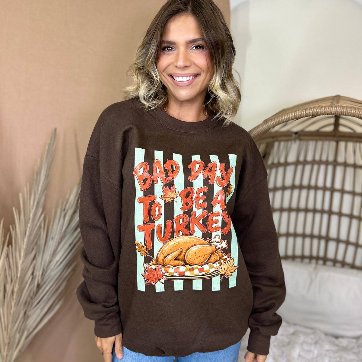 Bad Day to be a Turkey Graphic Sweatshirt-130 Graphic Tees-Heathered Boho-Heathered Boho Boutique, Women's Fashion and Accessories in Palmetto, FL