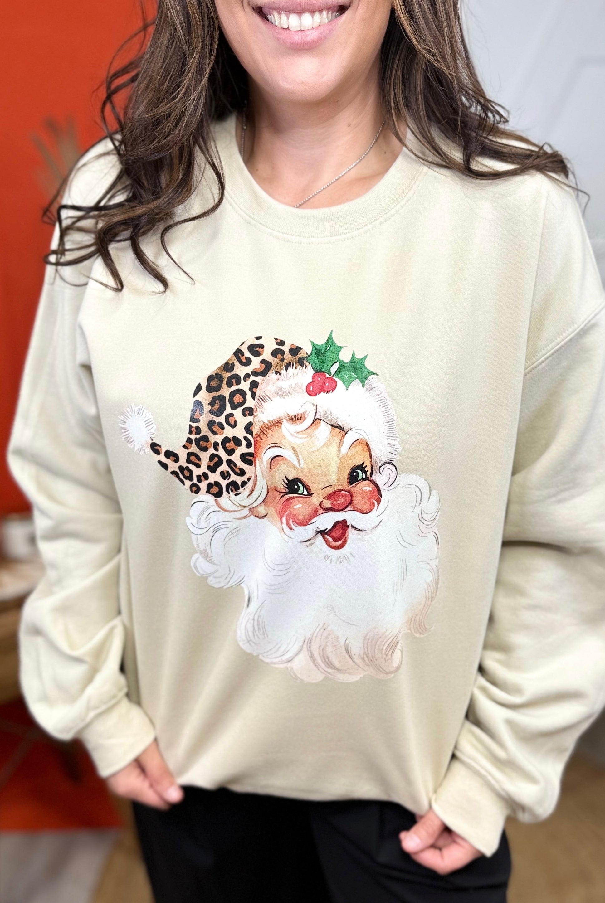 Santa in a Leopard Hat Graphic Sweatshirt-Sand-130 Graphic Tees-Heathered Boho-Heathered Boho Boutique, Women's Fashion and Accessories in Palmetto, FL