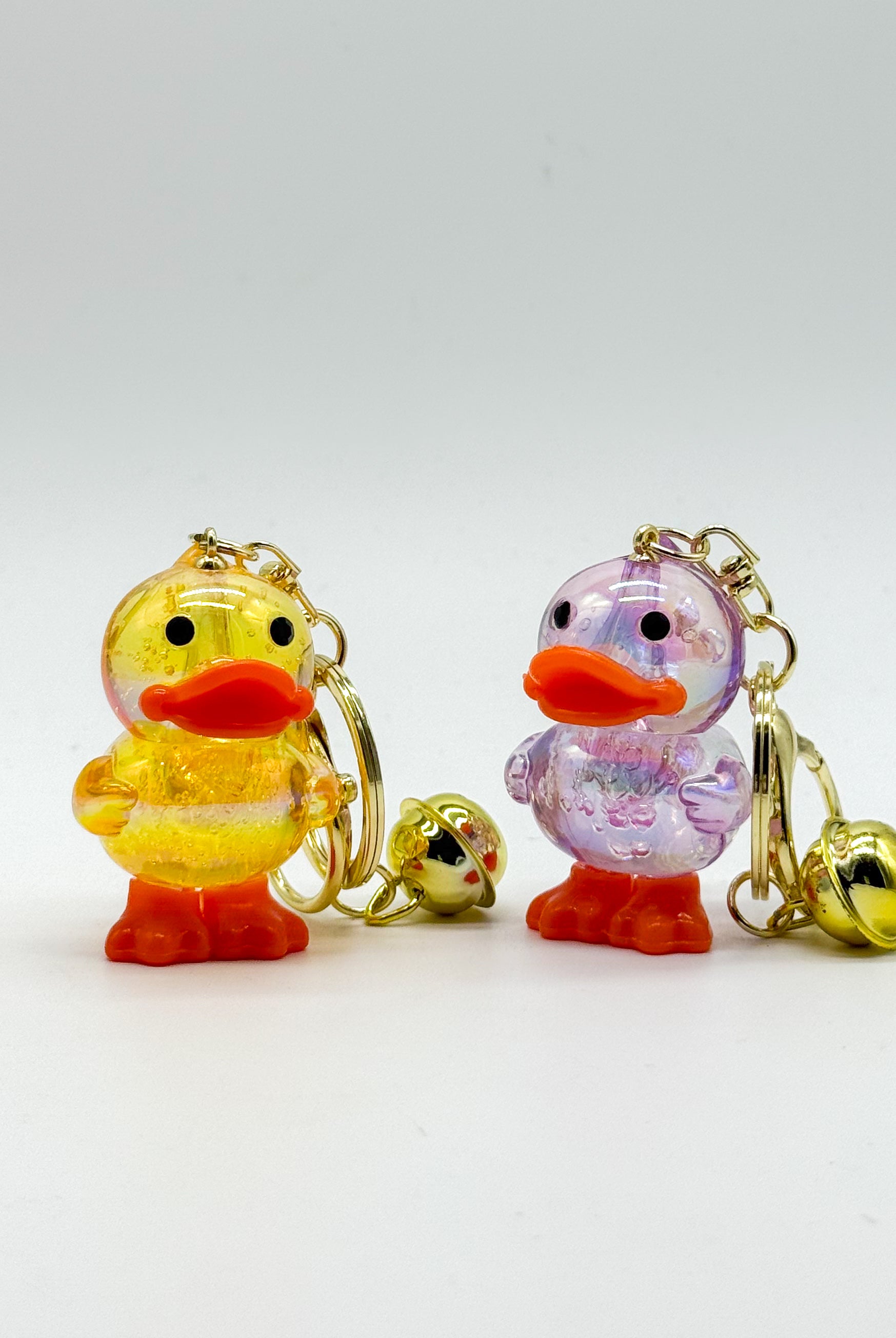 Restock: Holo Duck Bag Charm-340 Other Accessories-Heathered Boho-Heathered Boho Boutique, Women's Fashion and Accessories in Palmetto, FL