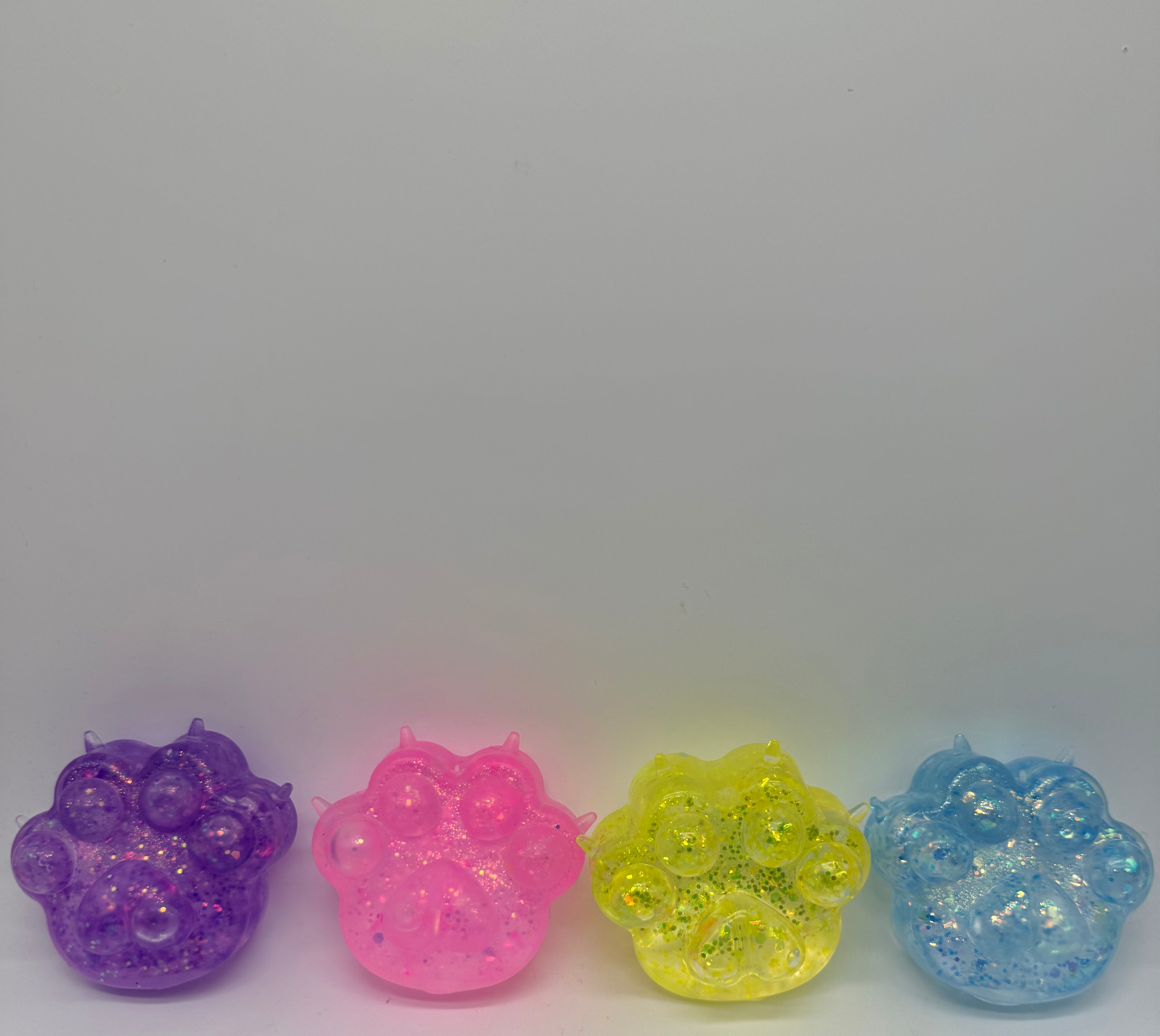 Glitter Paw Squishy-340 Other Accessories-youngs-Heathered Boho Boutique, Women's Fashion and Accessories in Palmetto, FL
