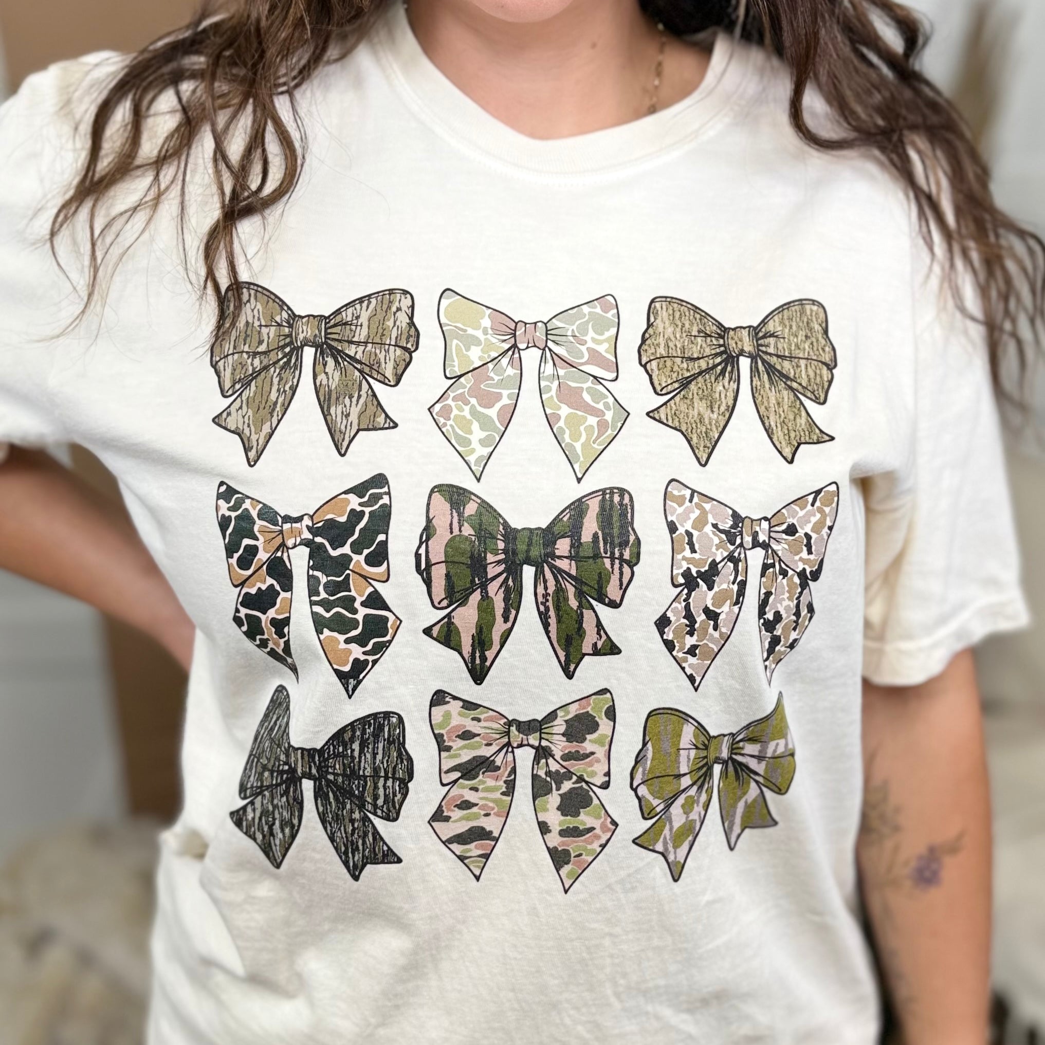 Camo Bows Graphic Tee-130 Graphic Tees-Heathered Boho-Heathered Boho Boutique, Women's Fashion and Accessories in Palmetto, FL