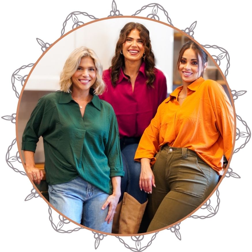 Three women wearing colorful shirts in a circular frame