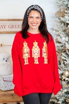 Nutcracker Metallic Puff Graphic Sweatshirt-130 Graphic Tees-SUGAR STITCH-Heathered Boho Boutique, Women's Fashion and Accessories in Palmetto, FL