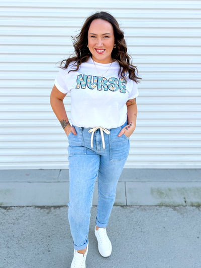 Daisy Nurse Graphic Tee-130 Graphic Tees-Heathered Boho-Heathered Boho Boutique, Women's Fashion and Accessories in Palmetto, FL