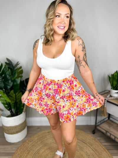 Spinning in Floral Skirt